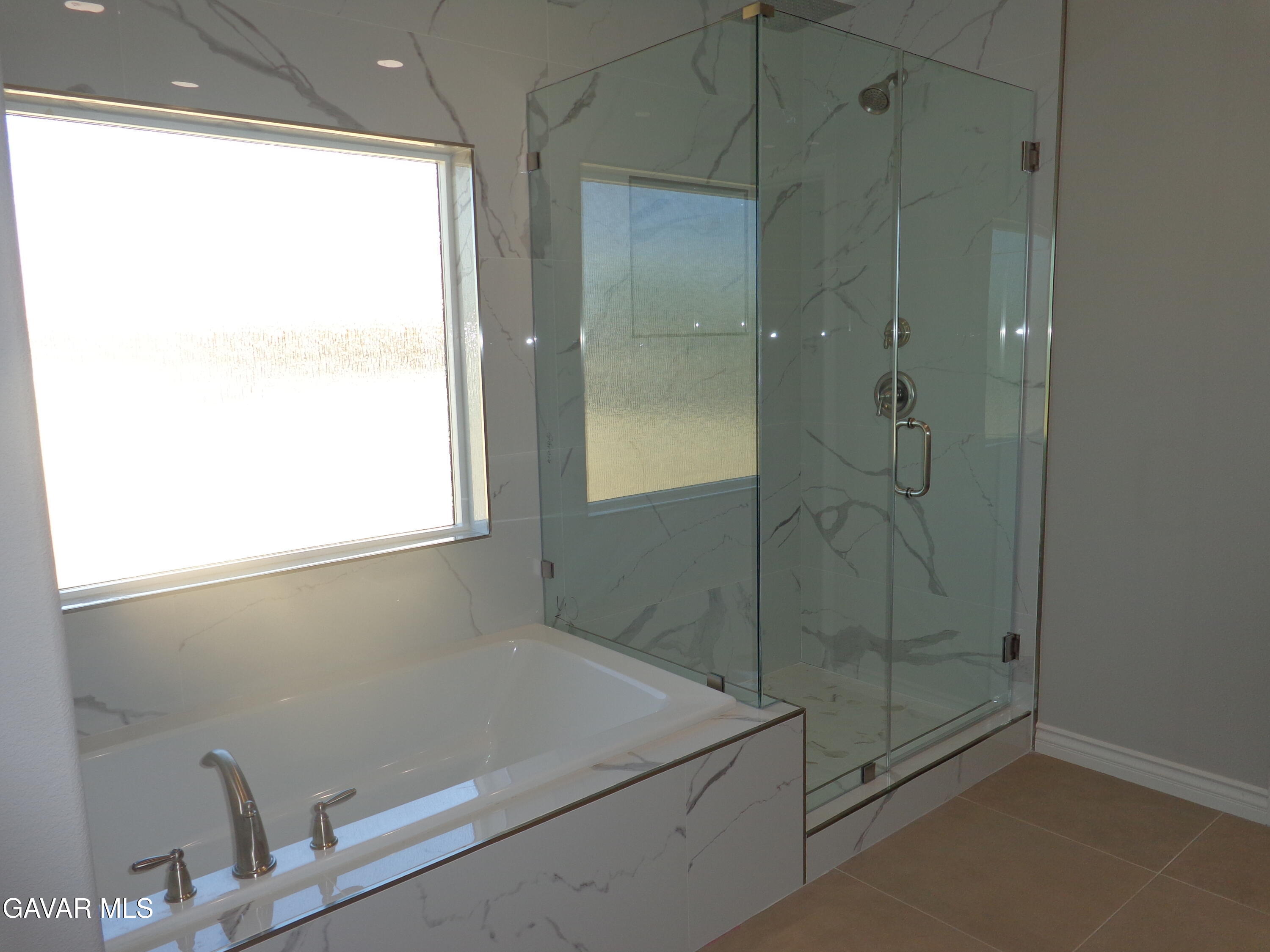 18255 Winnetka Road Apple Valley, CA 92307 - Photo 16 of 33 a bathroom with a shower