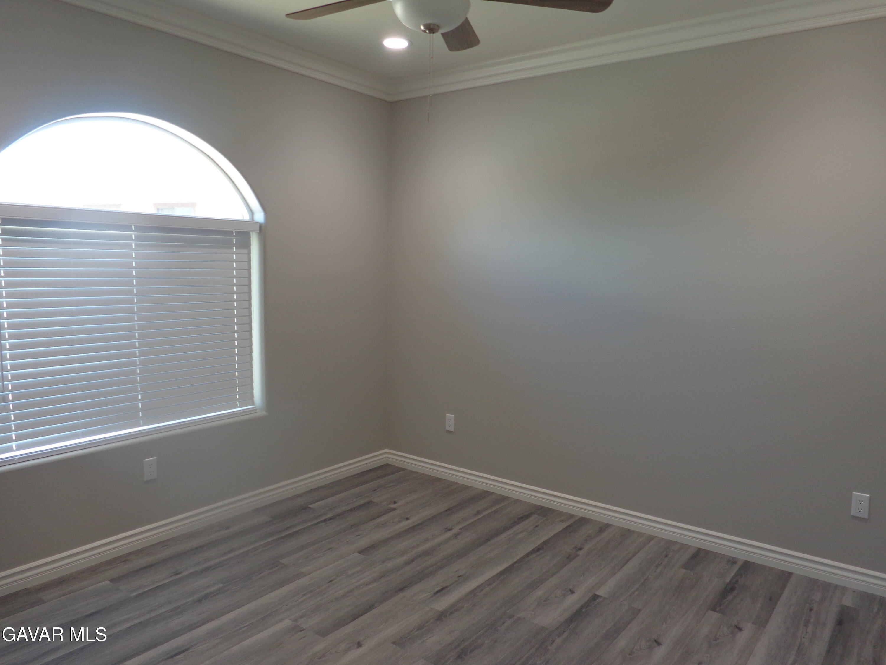 18255 Winnetka Road Apple Valley, CA 92307 - Photo 24 of 33 a view of a small space with wooden floor and a window
