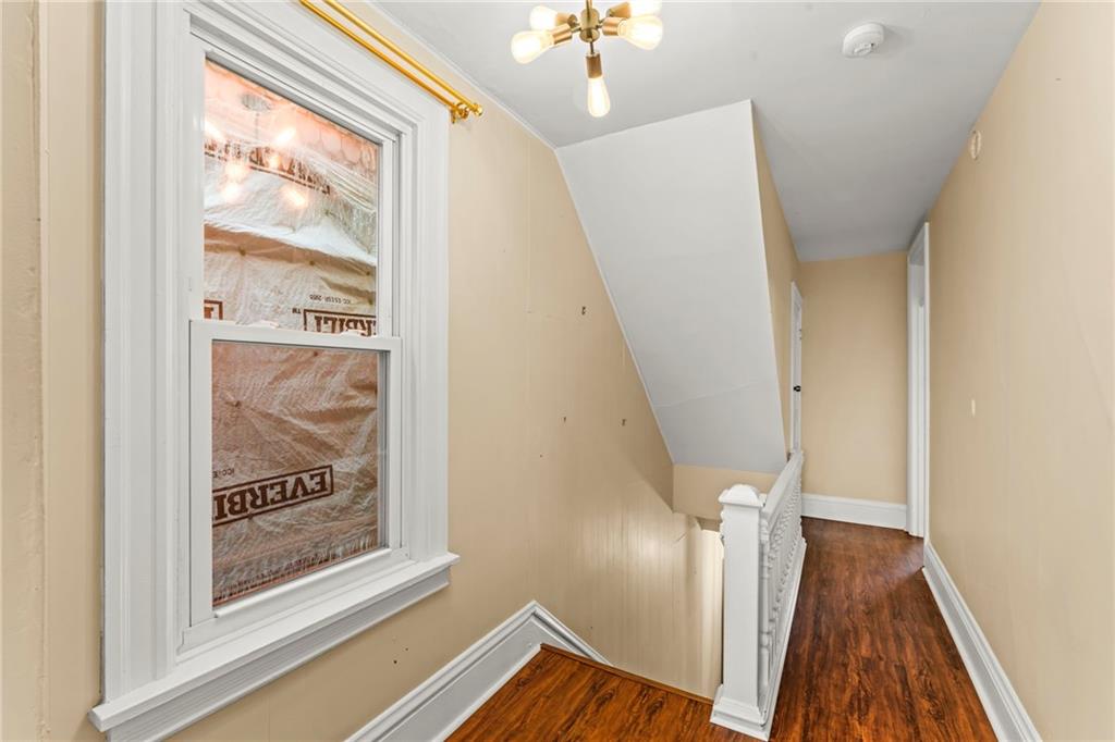3350 Webster Avenue Pittsburgh, PA 15219 - Photo 11 of 23 a view of a hallway with wooden floor and entryway
