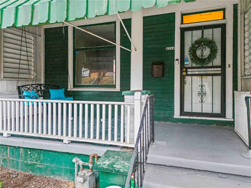 3350 Webster Avenue Pittsburgh, PA 15219 - Photo 2 of 23 a porch with seating space and garden