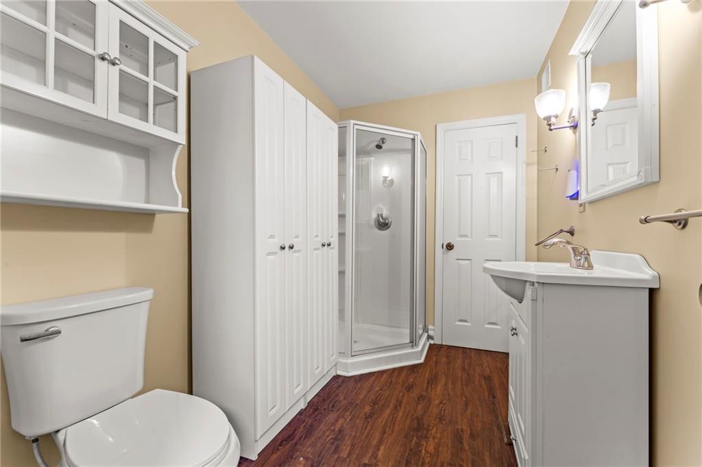 3350 Webster Avenue Pittsburgh, PA 15219 - Photo 10 of 23 a bathroom with a sink a toilet and shower