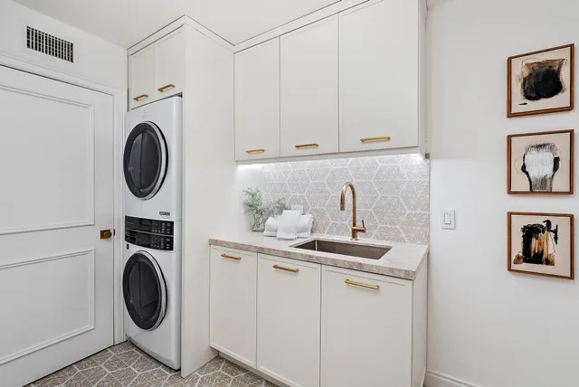 a picture of a bathroom with a sink