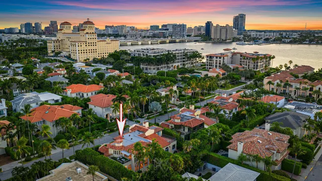 a view of swimming pool with chairs