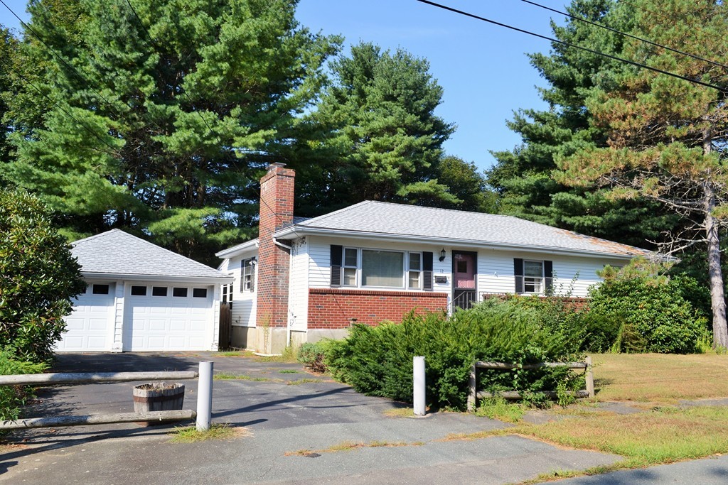 12 Scenna Road Beverly, MA 01915 - Photo 1 of 6 a front view of a house with a yard