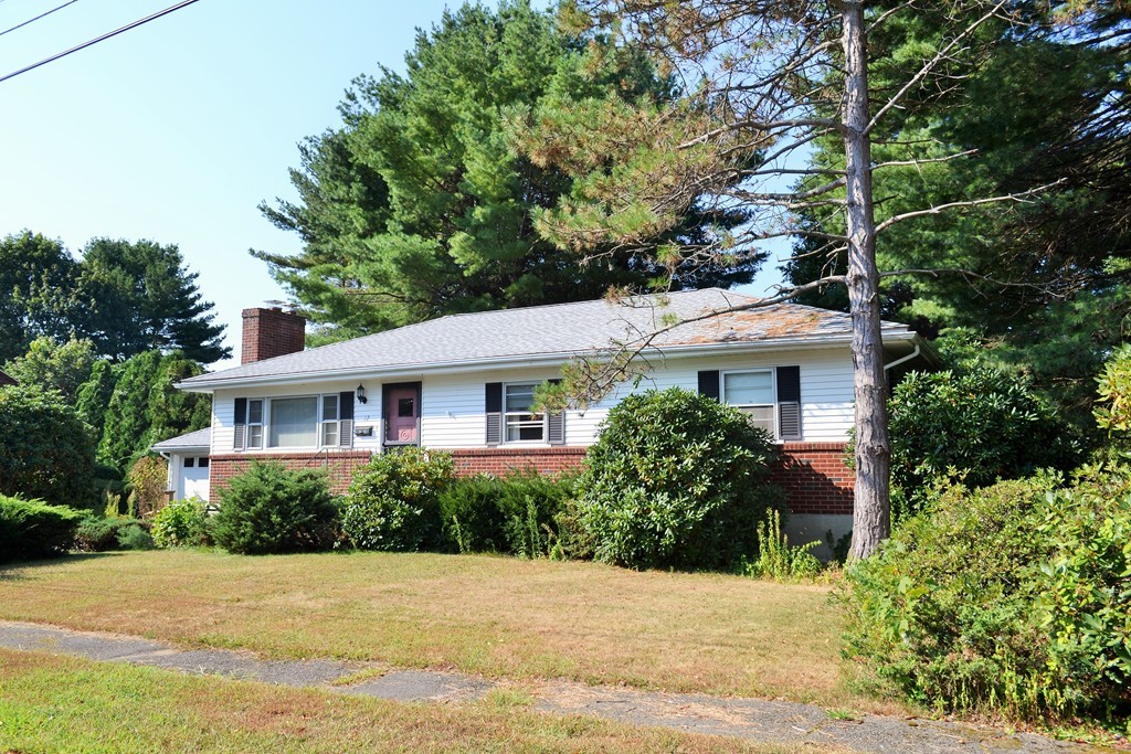 12 Scenna Road Beverly, MA 01915 - Photo 2 of 6 a front view of a house with a garden