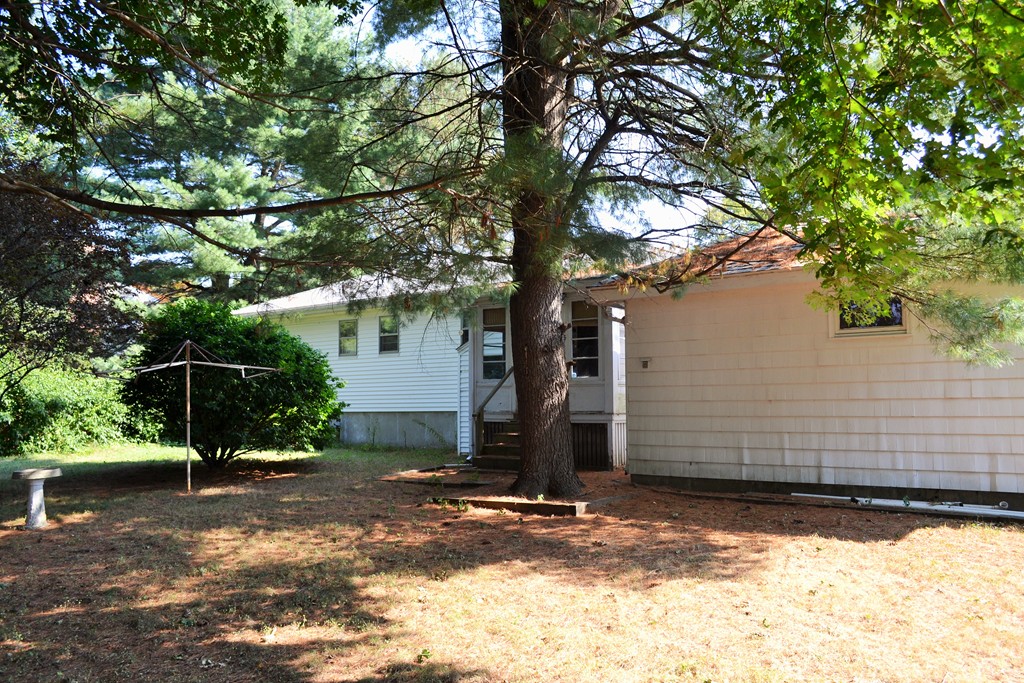 12 Scenna Road Beverly, MA 01915 - Photo 3 of 6 a front view of a house with a yard