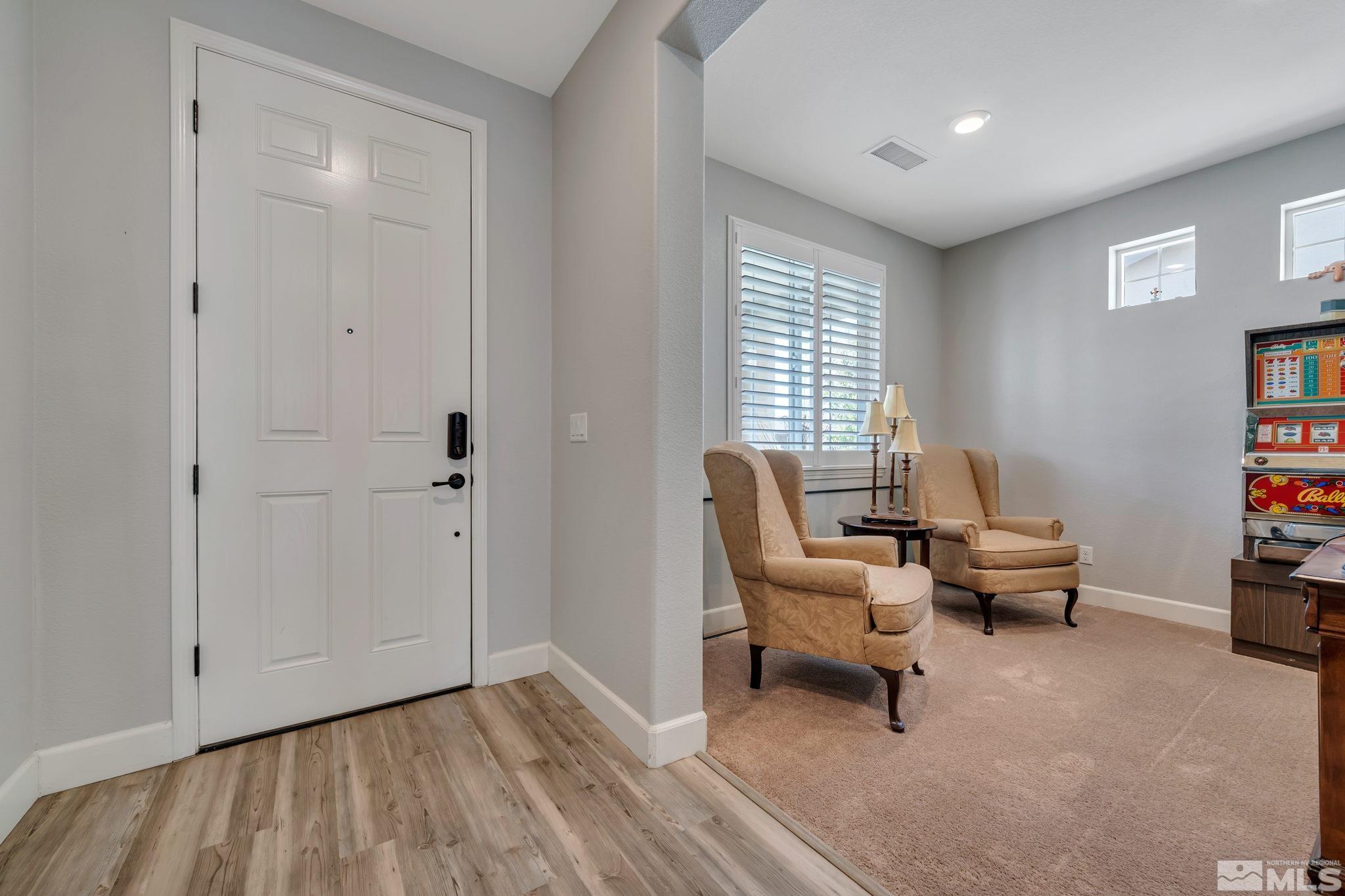 10128 Quintana Drive Reno, NV 89521 - Photo 26 of 34 a living room with furniture and a window