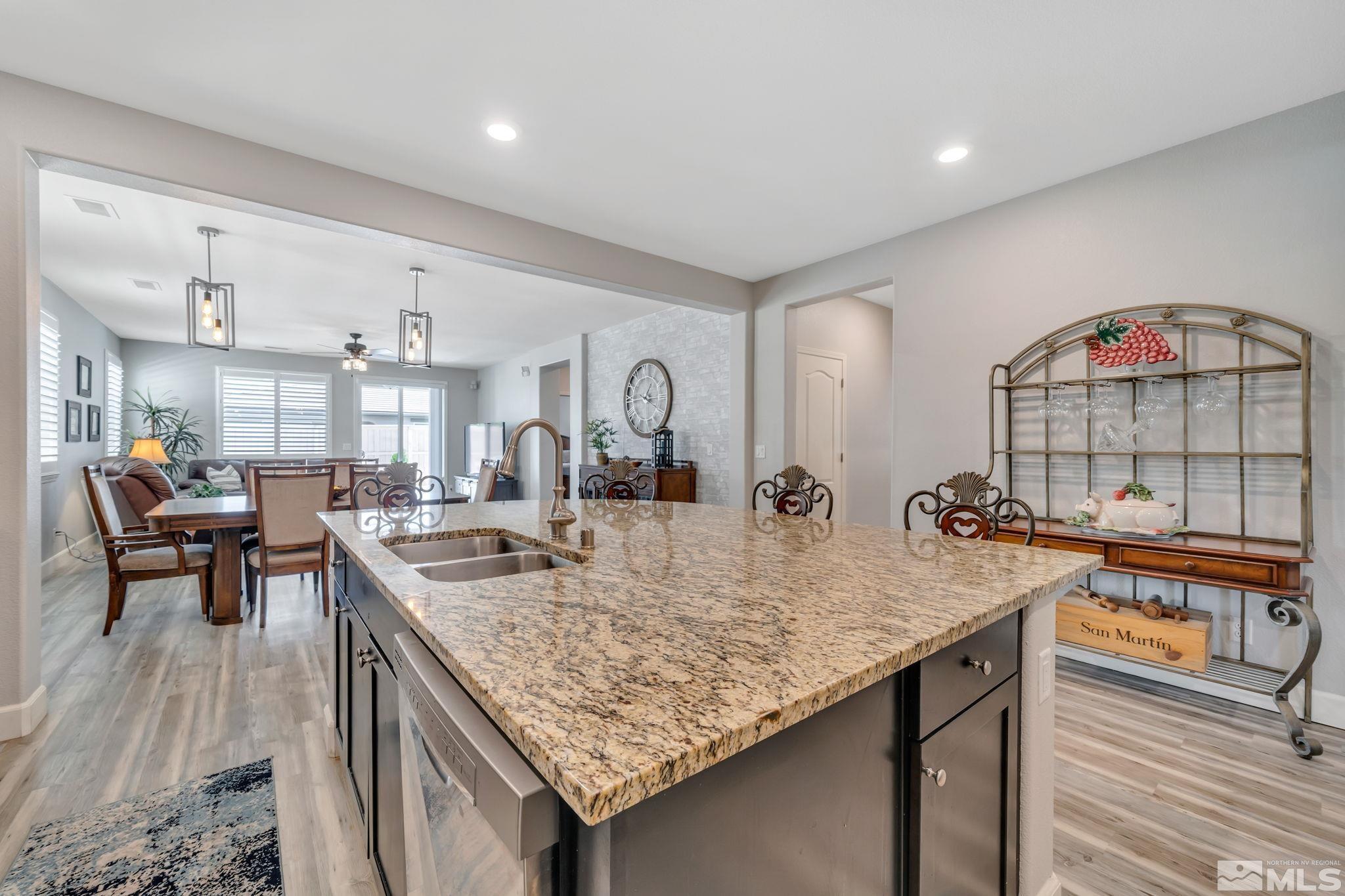 10128 Quintana Drive Reno, NV 89521 - Photo 3 of 34 a kitchen with counter space and breakfast area
