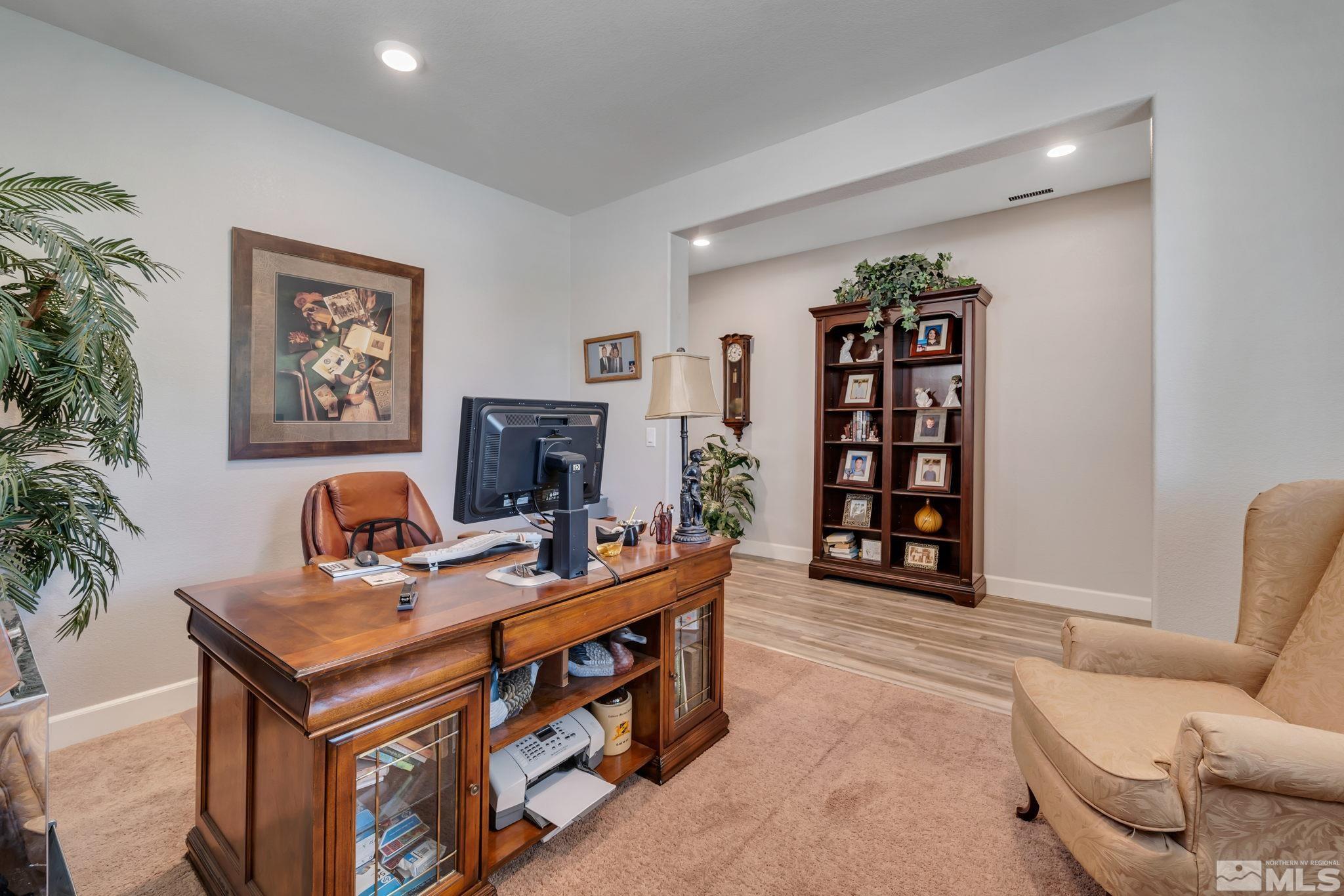 10128 Quintana Drive Reno, NV 89521 - Photo 6 of 34 a living room with furniture and a flat screen tv