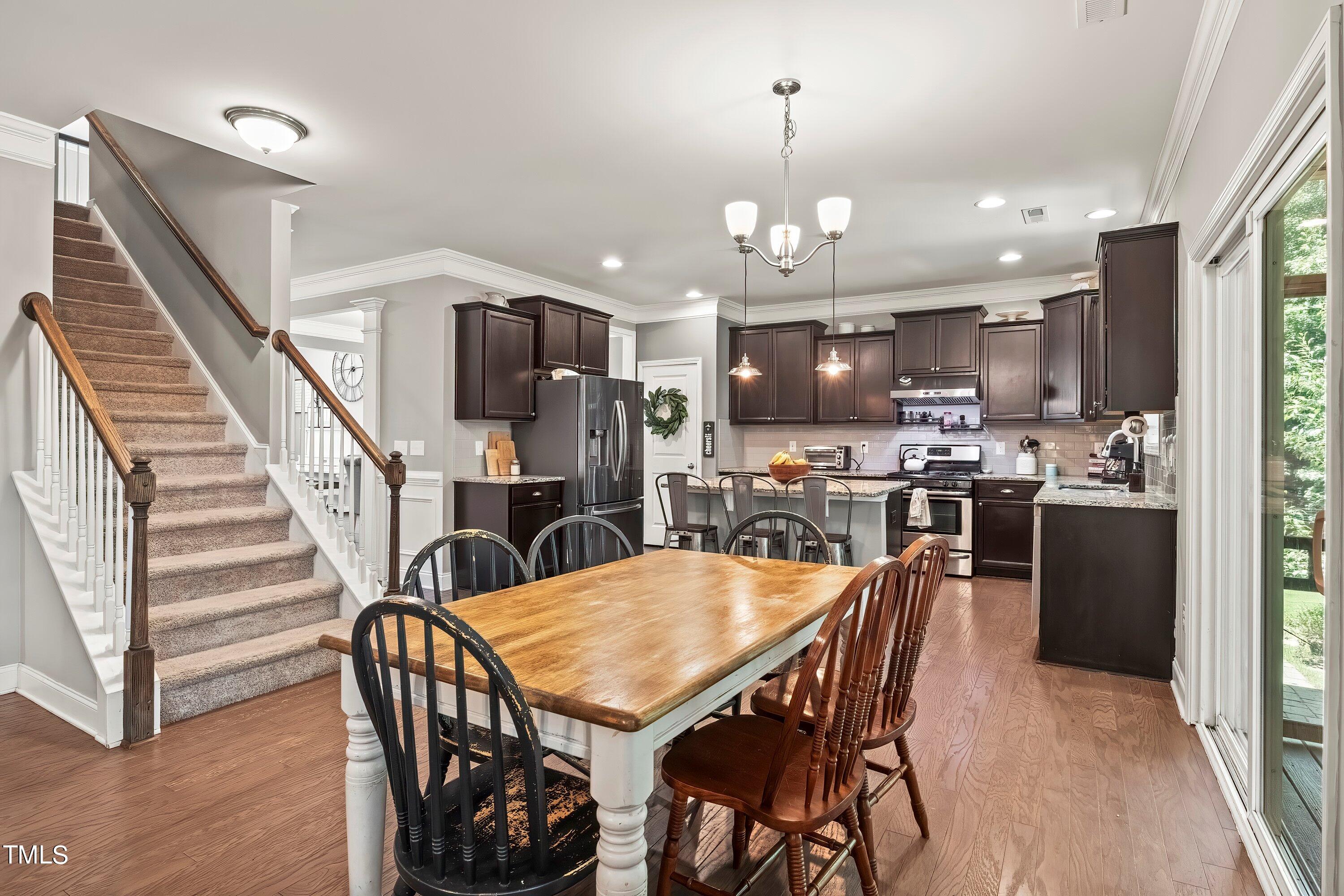 7406 Randshire Way Raleigh, NC 27616 - Photo 10 of 38 a view of a dining room with furniture
