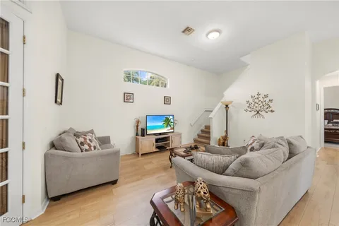 a living room with furniture and a couch