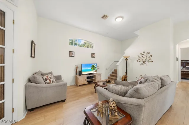 a living room with furniture and a couch