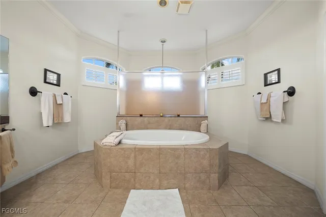 a bath room with a bath tub and a sink