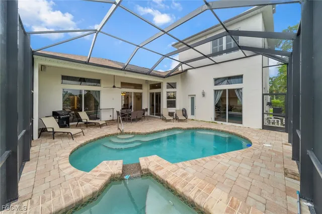 a view of a patio with couches chairs and potted plants