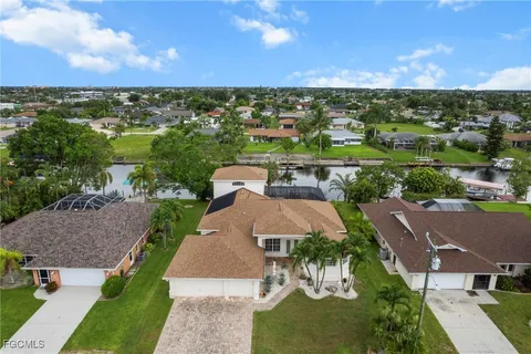 an aerial view of a house with a garden