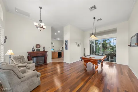 a living room with furniture and a table