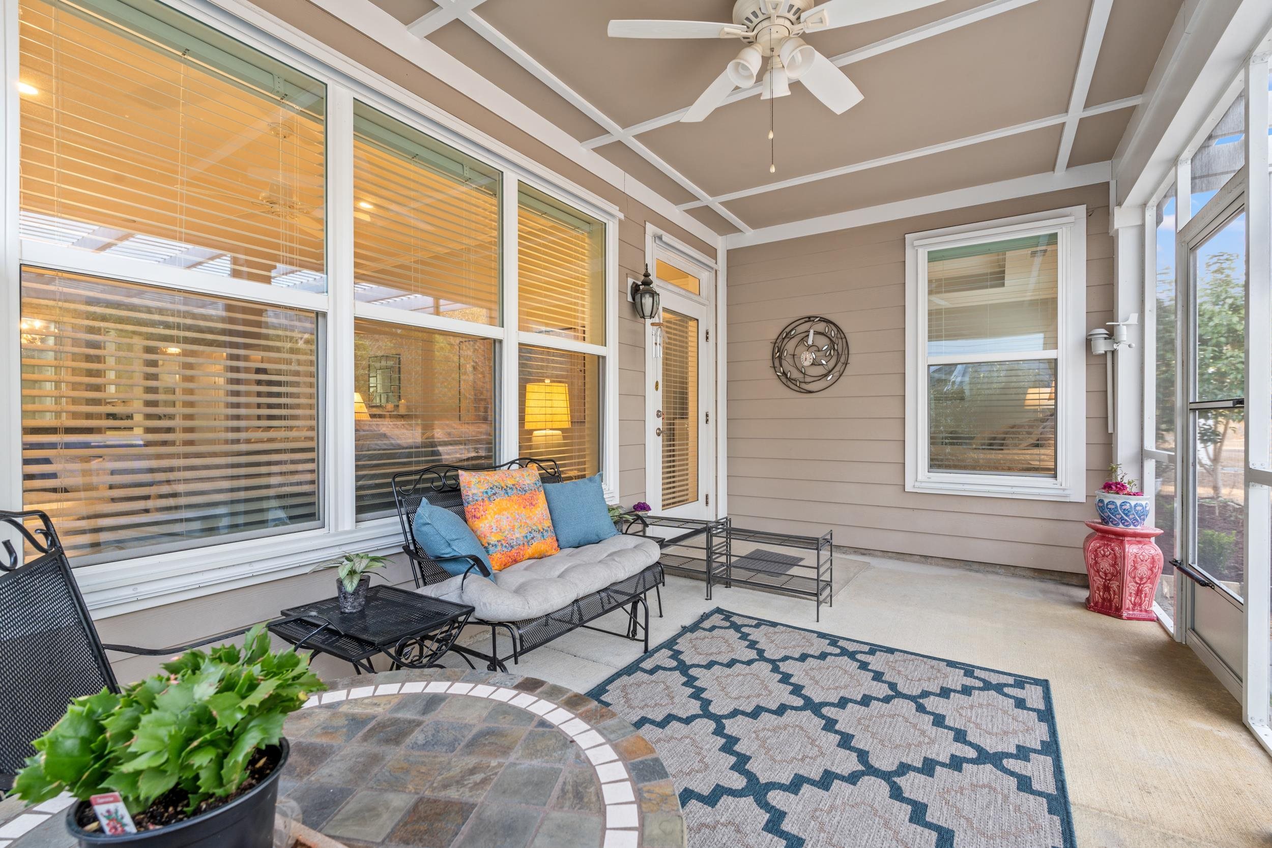 1979 Suncrest Drive Myrtle Beach, SC 29577 - Photo 28 of 28 Sunroom with a ceiling fan and a patio