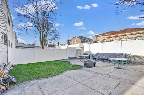 a backyard of a house with seating space