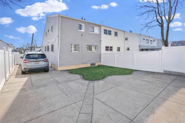 a view of a car park in front of a building