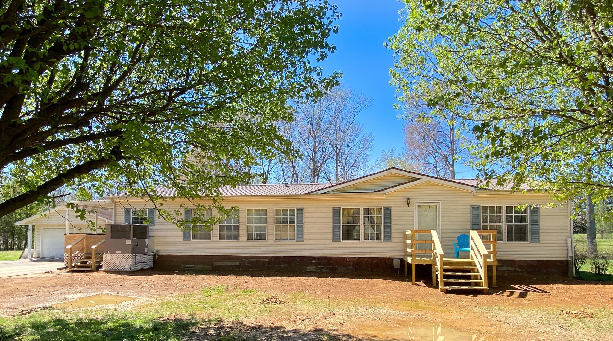 72 Pratt Road Manchester, TN 37355 - Photo 1 of 24 a front view of a house with a yard
