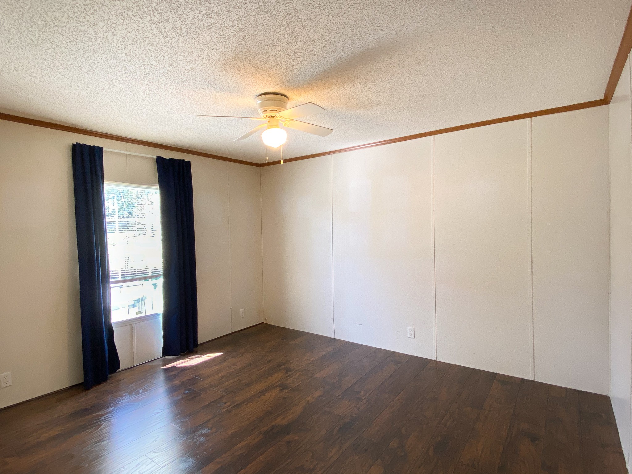 72 Pratt Road Manchester, TN 37355 - Photo 16 of 24 an empty room with wooden floor closet and windows