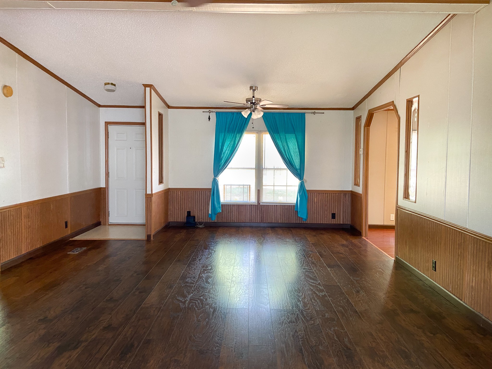72 Pratt Road Manchester, TN 37355 - Photo 5 of 24 a view of empty room with wooden floor and fan