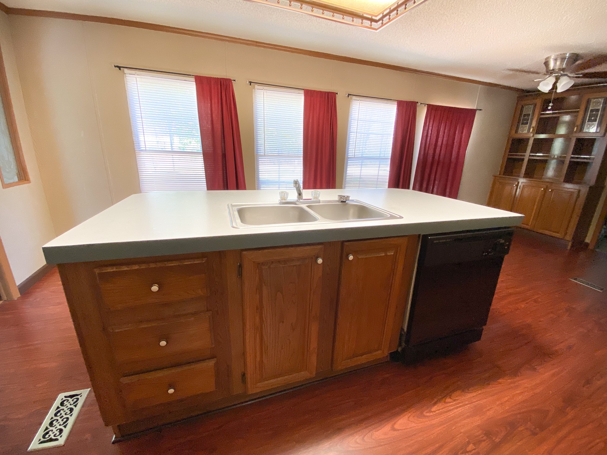 72 Pratt Road Manchester, TN 37355 - Photo 8 of 24 a kitchen with a sink a window and wooden floor