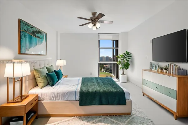 a bathroom with double sink and a mirror
