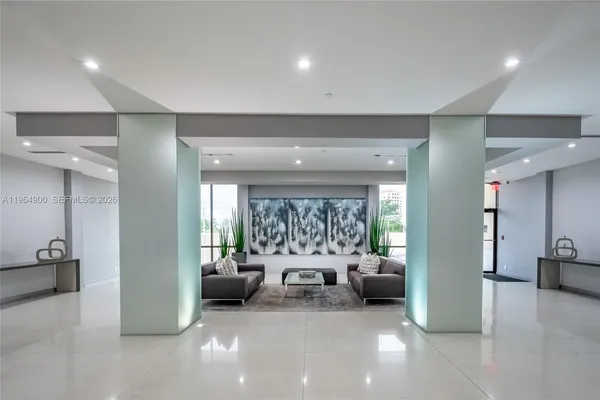 a view of an empty room with a window