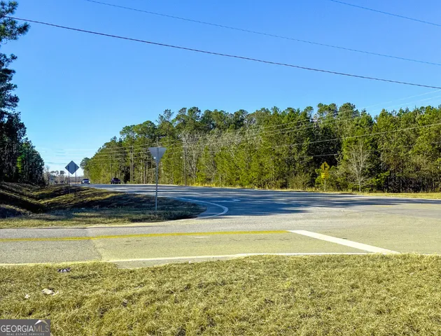 a view of a swimming pool and an outdoor space
