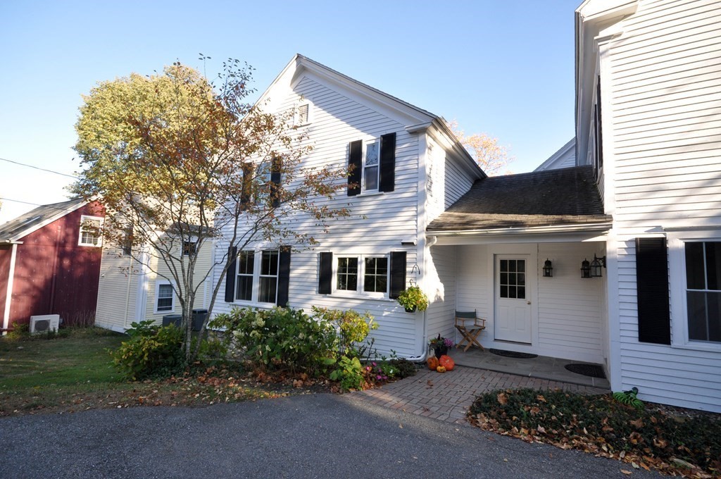 3 Littleton Road, Unit C Harvard, MA 01451 - Photo 2 of 31 a front view of a house with garden