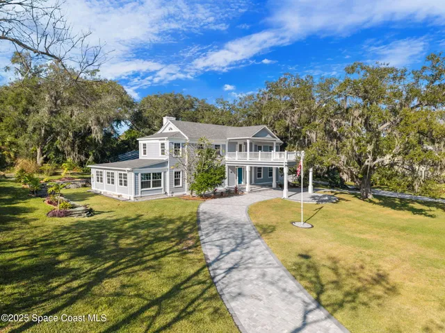 a kitchen with granite countertop a sink and cabinets
