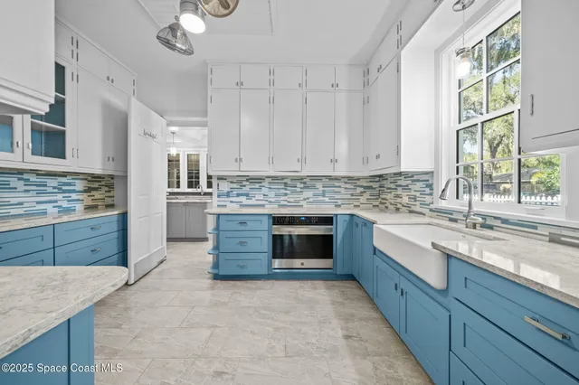 a front view of a house with a swimming pool