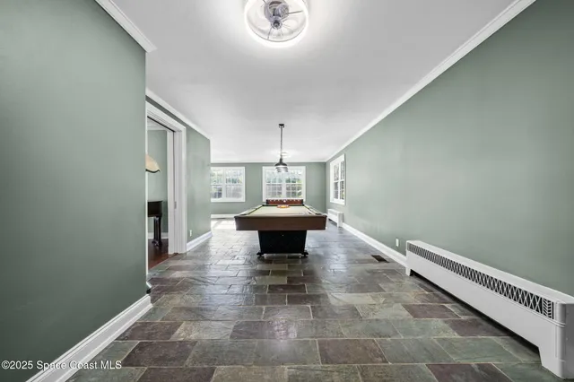 a kitchen with granite countertop a sink and cabinets