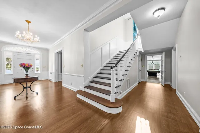 a kitchen with granite countertop cabinets stainless steel appliances and sink