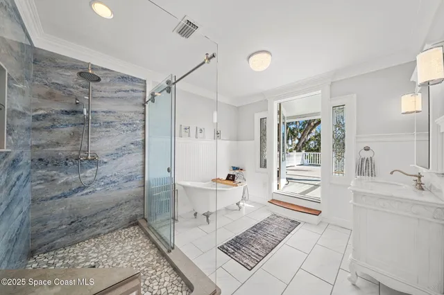 a view of a backyard with large trees