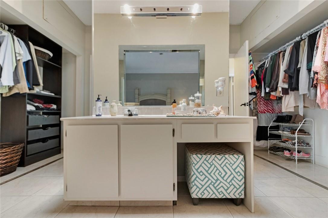 8067 Buttonwood Circle Tamarac, FL 33321 - Photo 12 of 33 a bathroom with a sink and a mirror