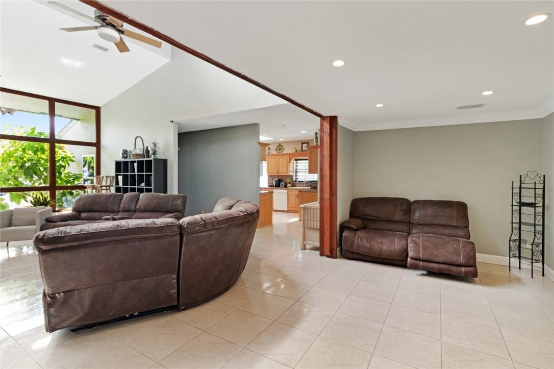 8067 Buttonwood Circle Tamarac, FL 33321 - Photo 20 of 33 a living room with furniture and a large window