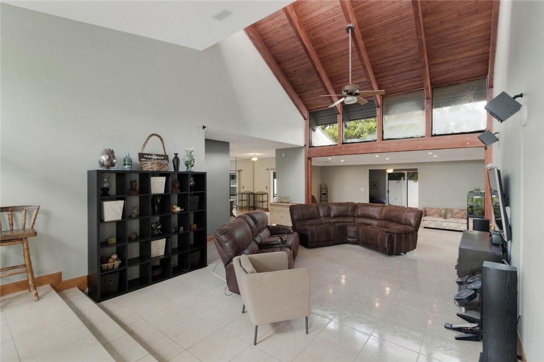 8067 Buttonwood Circle Tamarac, FL 33321 - Photo 5 of 33 a living room with furniture and wooden floor