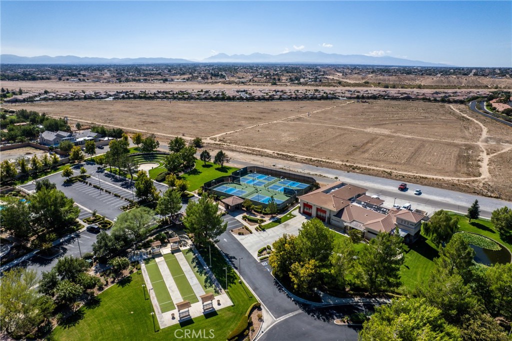an aerial view of a house with a lake view