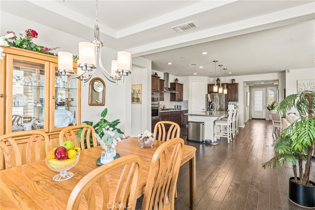 11636 Cascade Street Apple Valley, CA 92308 - Photo 13 of 70 a bedroom with furniture and a large window
