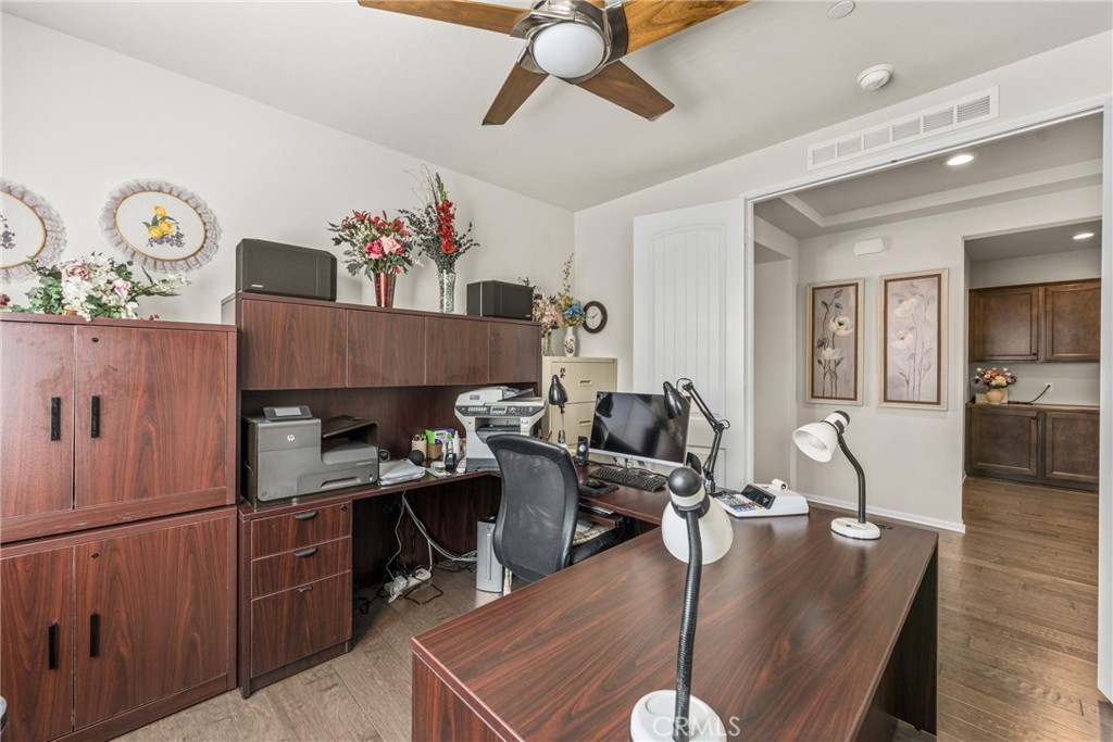 11636 Cascade Street Apple Valley, CA 92308 - Photo 30 of 70 a view of a dining room with furniture