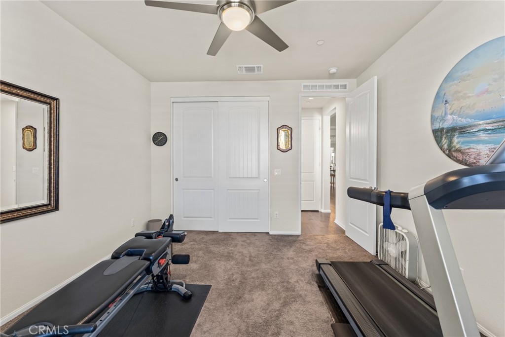 11636 Cascade Street Apple Valley, CA 92308 - Photo 34 of 70 a view of a room with gym equipment