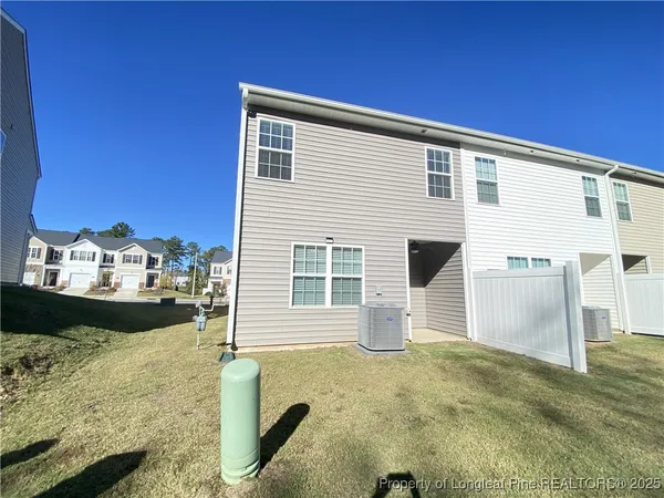 a view of a house with a patio