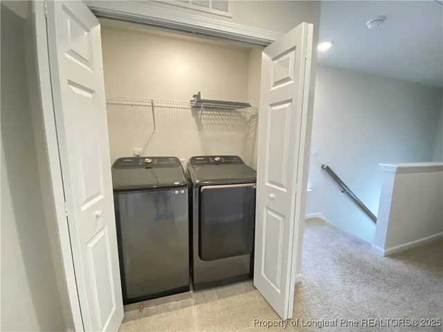 a utility room with closet
