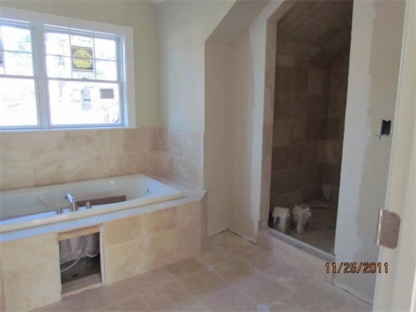 2 Mayo Road Wellesley, MA 02482 - Photo 7 of 9 a bathroom with a sink and a bathtub