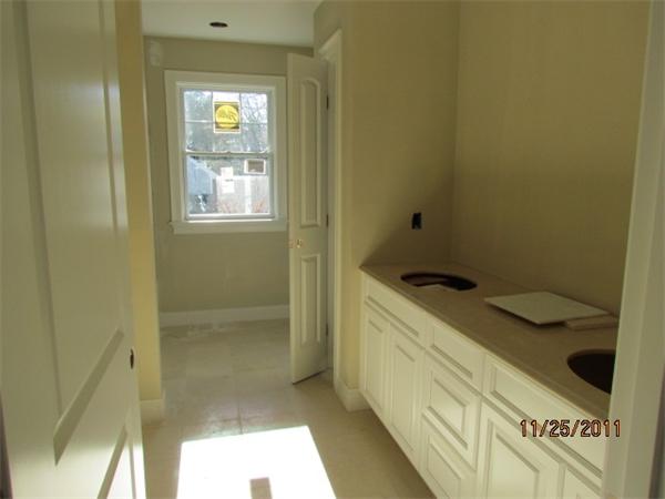 2 Mayo Road Wellesley, MA 02482 - Photo 9 of 9 a bathroom with a sink and a mirror
