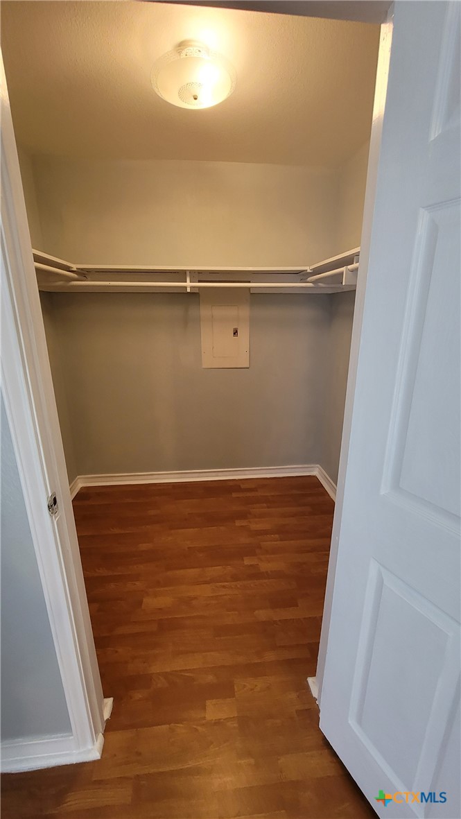 127-129 McAdams Road Goliad, TX 77963 - Photo 26 of 33 a view of closet with wooden floor