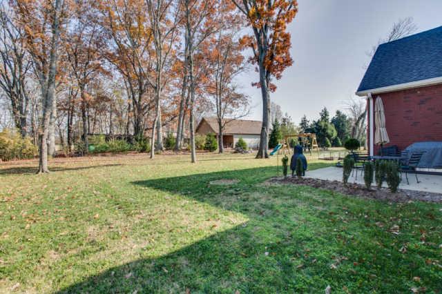 439 Conquest Road Murfreesboro, TN 37128 - Photo 20 of 20 There's no need to go to the park to play. This back yard has it's own park like setting.