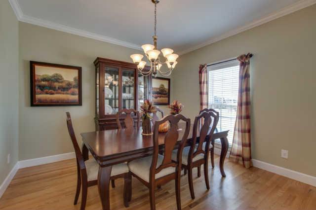 439 Conquest Road Murfreesboro, TN 37128 - Photo 2 of 20 Formal dinning room has hardwood floors and upgraded, beautiful chandelier.